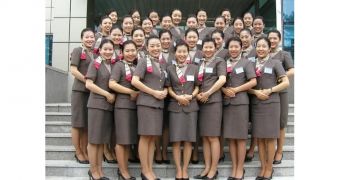 Asiana Airlines flight attendants adhere to a specific dress code