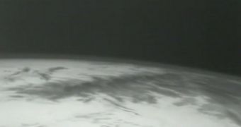Dragon uses an onboard camera to image Earth, on May 22, 2012