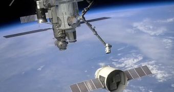 Rendition of a rendezvous between the SpaceX Dragon space capsule (foreground) and the ISS