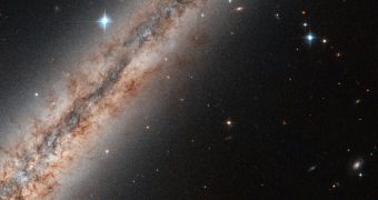 This is an image of NGC 891, collected by the ACS instrument aboard Hubble