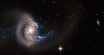Spiral galaxy NGC 7714 is now badly twisted and deformed