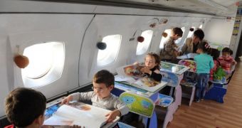 Headmaster turns an old plane into a classroom