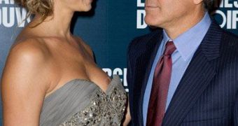 Stacy Keibler and George Clooney in Paris for the “Ides of March” premiere