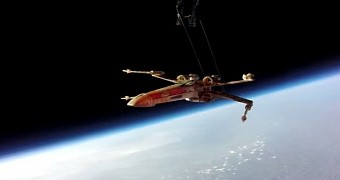 Plastic X-wing fighter plane travels to space and back
