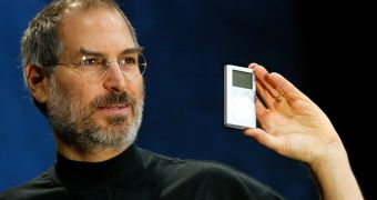 Steve Jobs unveiling one of the very first iPods