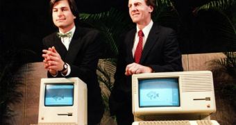 Steve Jobs (left) and John Sculley displaying new computer hardware in 1984