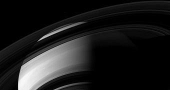 Saturn and a couple of its moons (click for the full image)