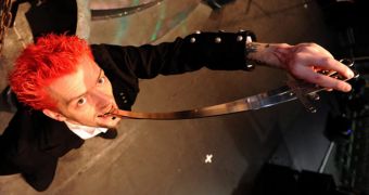 Ian Brown swallows two curved knives