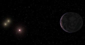 This rendition shows the exoplanet GJ 667Cc orbiting its parent star, which is a member of a three-star system