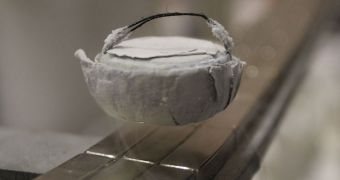 A large-scale superconductor levitating over a magnet