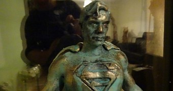 Superman covered in bronze