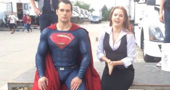 Superman and Lois Lane (Henry Cavill and Amy Adams) prepare to be doused in ice water for the ALS Challenge