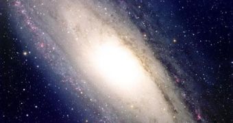 The Andromeda galaxy with its tight arms could house a central black hole about 180 million times more massive than the Sun