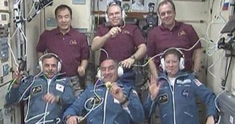 The Expedition 23 crew reunites in orbit