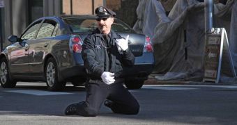 Retired cop Tony Lepore controls traffic while dancing