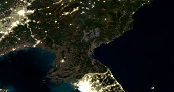 This satellite image shows North Korea in pitch-black darkness