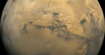 At the center of this Martian orbital image is Valles Marineris, over 3000 km long and up to 8 km deep