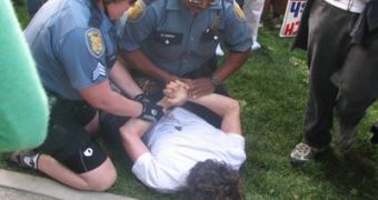 The police arresting a student