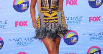 Demi Lovato strikes a pose on the red carpet at the Teen Choice Awards 2012
