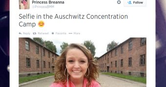 Teenage girl snaps smiling photo at Auschwitz, shares it with the online community