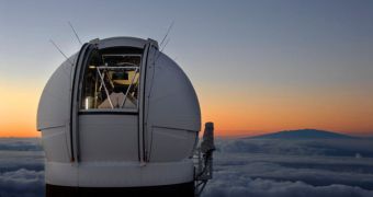 ThePan-STARRS telescope dominates the clouds above Hawaii