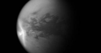 This Cassini image shows the Texas-sized white arrow in Titan's atmosphere