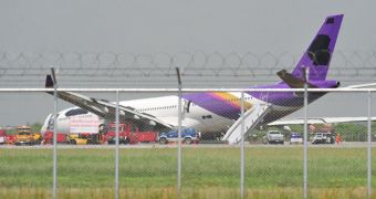 Thai Airways logo is painted over on skidding plane
