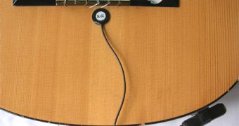 A piezzo sensor, used as a pick-up for an acoustic guitar