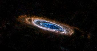Andromeda seen through Herschel's SPIRE instrument; red is only a few tens of degrees above absolute zero, blue is hotter