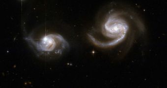 Studying distant pairs of galaxies can tell us if the Universe is flat or curved