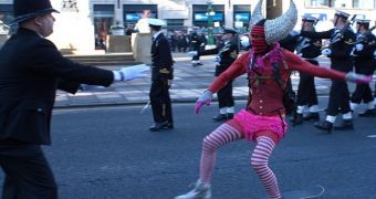 38-year-old Jose Paulo Da Silveria crashes a Remembrance Day parade, in a devil's outfit