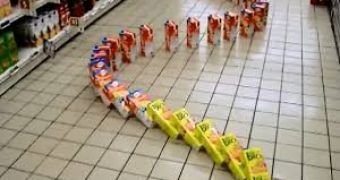 Cora sets up a large domino in one if its supermarkets