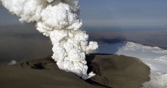 The eruption in Iceland after it penetrated Eyjafjallajökull's icecap; new ash covers the glacier