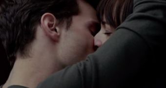 Christian Grey and Anastasia Steele have a very passionate moment in an elevator