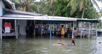 Flooding in Tuvalu's capital, Funafuti. This is going to be permanent due to global warming