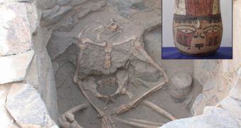 The headless skeleton in a seated position next to the "head jar"