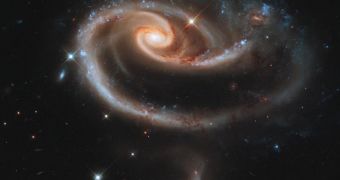 To celebrate Hubble's 21st anniversary, astronomers at the Space Telescope Science Institute, in Baltimore, pointed Hubble's eye at an especially photogenic pair of interacting galaxies called Arp 273