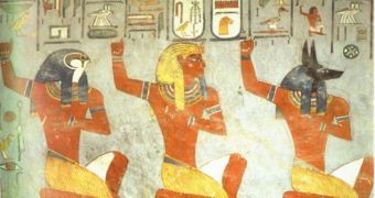 Wall painting in the tomb of Seti I: the falcon-headed god is Horus, the jackal-headed god is Anubis