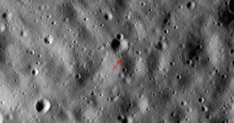 Arrow shows highest point on the Moon, 10,786 meters (35,387 feet) above the mean radius. North is up, Sun elevation is 16° from the horizon, image 500 meters wide, from M133865651L,R mosaic.