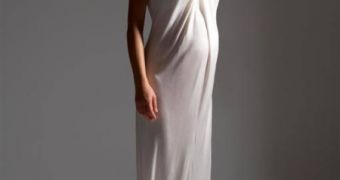 Sales representatives report more and more pregnant women choose to wear white on their wedding day