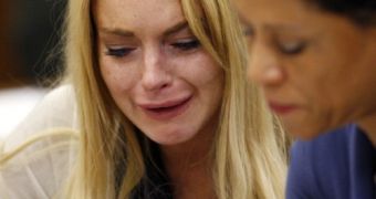 Lindsay Lohan reacts with tears and disbelief to jail sentence