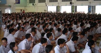 Over one thousand pupils in uniform during an assembly at a secondary school in Singapore