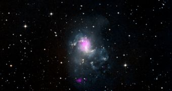 The magenta spots represent two ULX in the spiral galaxy NGC 1313