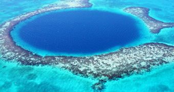 Blue Hole, a cenote (sinkhole) 120 m deep and 300 m wide in the Belize reefs