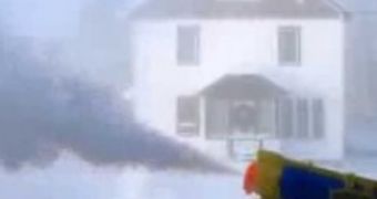 The man creates instant fog by shooting boiling water in extreme Canadian temperatures