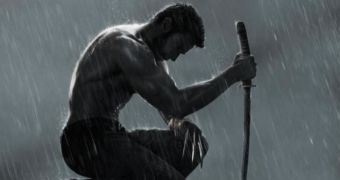 Hugh Jackman paints a solitary figure in new “The Wolverine” poster