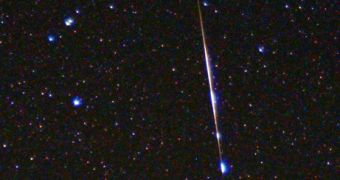 A Perseid meteor creates a vivid streak across the sky over Colorado on August 8, 2007