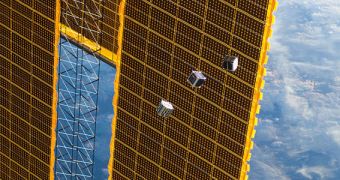 Image showing three CubeSats that were launched from the ISS in 2012, during Expedition 33