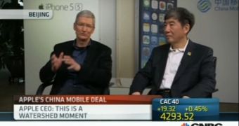 Apple CEO, Tim Cook (left) and Xi Guohua, China Mobile chief