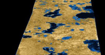 The irregular-shaped black holes in the ground appear to be lakes filled with liquid hydrocarbons, on Saturn's moon Titan